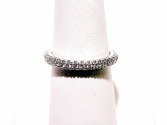 DIAMOND ARE PRONG SET ALL THE WAY AROUND ETERNITY BAND