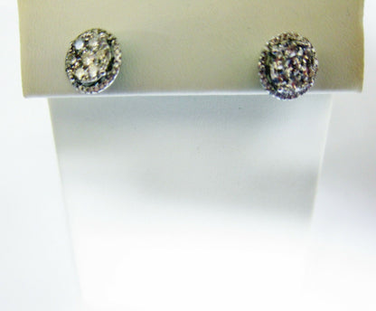 DIAMOND CENTER BIGGER THEN SMALLER THEN HALO STUD EARRING