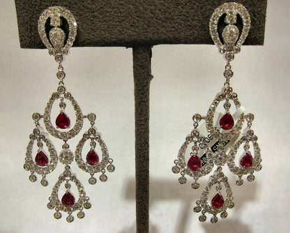 RUBY PEAR SHAPE EIGHT STONE SET WITH WHITE ROUND BRILLIANT