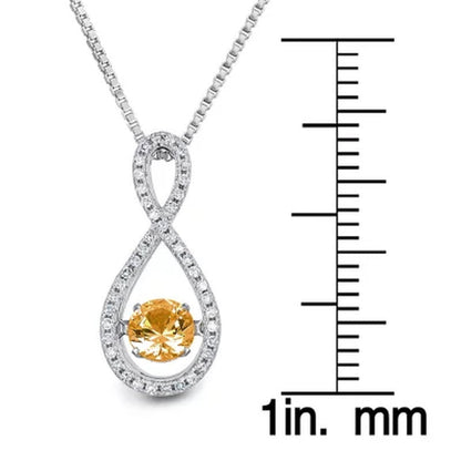Dancing Genuine Citrine and 0.12 CT. T.W. Diamond Infinity Pendant in Sterling S