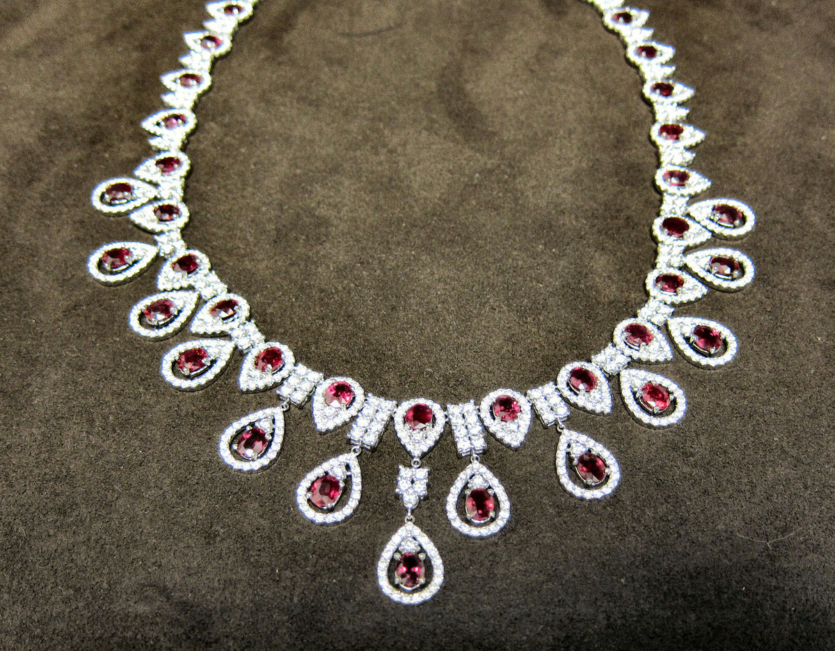 DIAMOND ROUND BRILLIANT SHAPE RUBY OVAL SHAPE DIAMOND NECKLACE