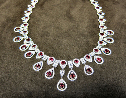 DIAMOND ROUND BRILLIANT SHAPE RUBY OVAL SHAPE DIAMOND NECKLACE