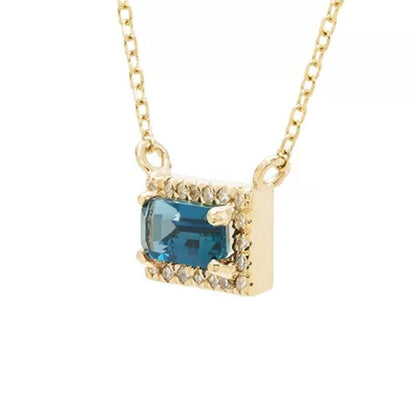 London Blue Topaz and .06 CT. T.W. Diamond Baguette Pendant Necklace in 14K Gold