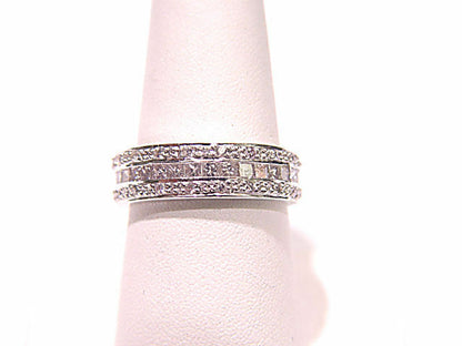 A ROW CENTER PRINCESS SHAPE SIDE 2 ROW ROUND BRILLIANT
