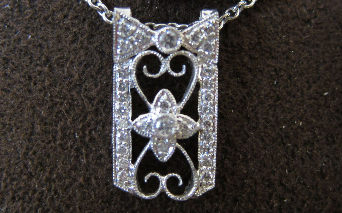 BOW HEART AND FLOWER PENDANT INCLUDED CHAIN
