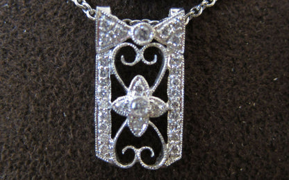 BOW HEART AND FLOWER PENDANT INCLUDED CHAIN