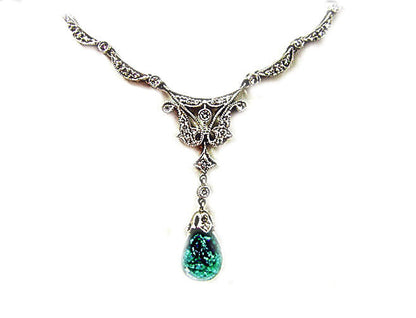 EMERALD BRIOLETTE SHAPE DIAMOND ROUND BRILLIANT SHAPE