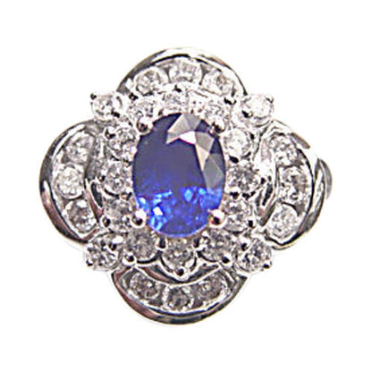 OVAL SAPPHIRE SET WITH ROUND BRILLIANT CHANNEL SET