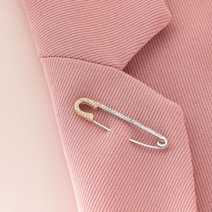 0.16 Ct. T.W. Diamond Safety Pin in Sterling Silver and 14Kt Yellow Gold