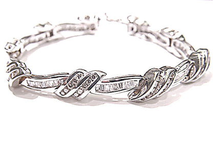 ROUND BRILLIANT CUT AND BAGUETTE CUT CHANNEL SET DIAMOND