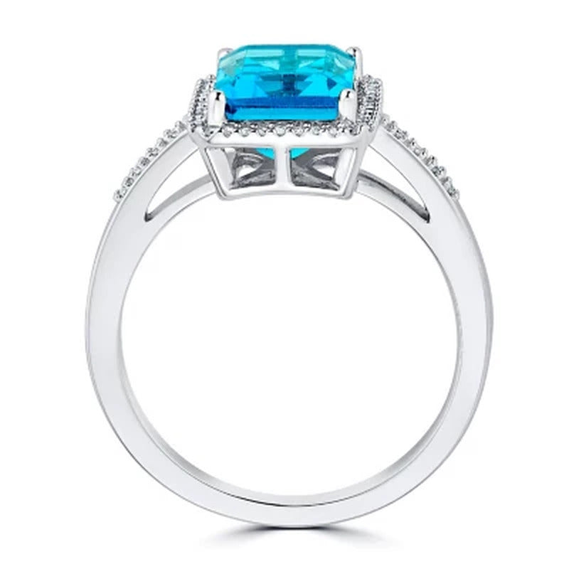 Blue Topaz and 0.14 CT. T.W. Diamond Ring in Sterling Silver
