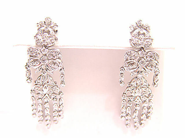 ROUND BRILLIANT SH DIAMOND BEZEL AND PRONG SET DIAMOND