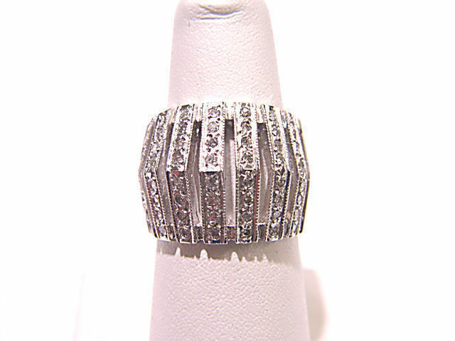 DIAMONDS SET ON TOP BAND IN 7 ROWS