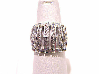 DIAMONDS SET ON TOP BAND IN 7 ROWS
