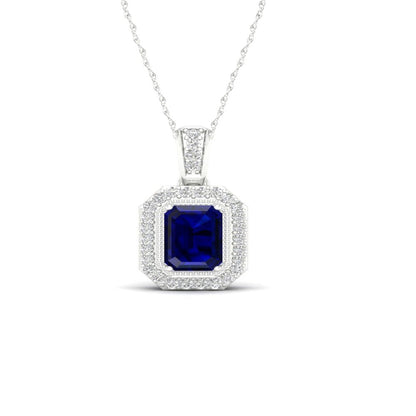 Imperial Gemstone 10K White Gold Emerald Cut Blue Sapphire 1/10 CT TW Diamond Ha