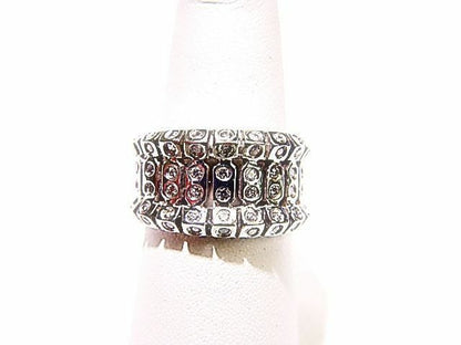 DIAMONDS ARE BEZEL SET ONLY ON TOP BAND