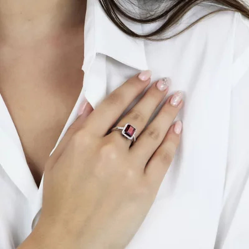 Lab Created Ruby and 0.14 CT. T.W. Diamond Ring in Sterling Silver