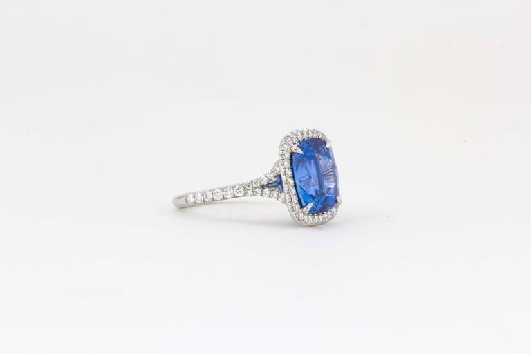 agl certified 6.58 ct sapphire cushion shape ceylon halo .52 ct round diamond
