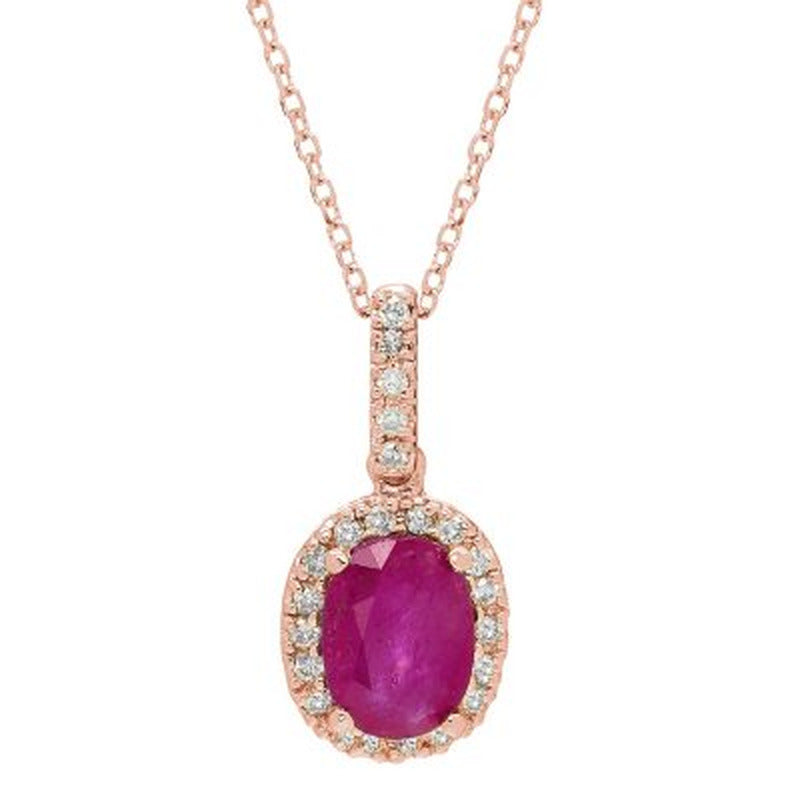 Genuine Ruby and 0.11 CT. T.W. Diamond Pendant in 14K Gold