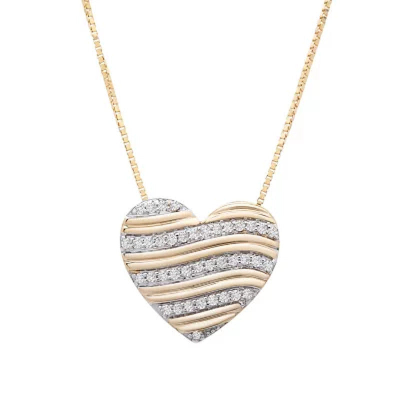 0.10 CT. T.W. Diamond Stripe Heart Pendant in 14K Yellow Gold
