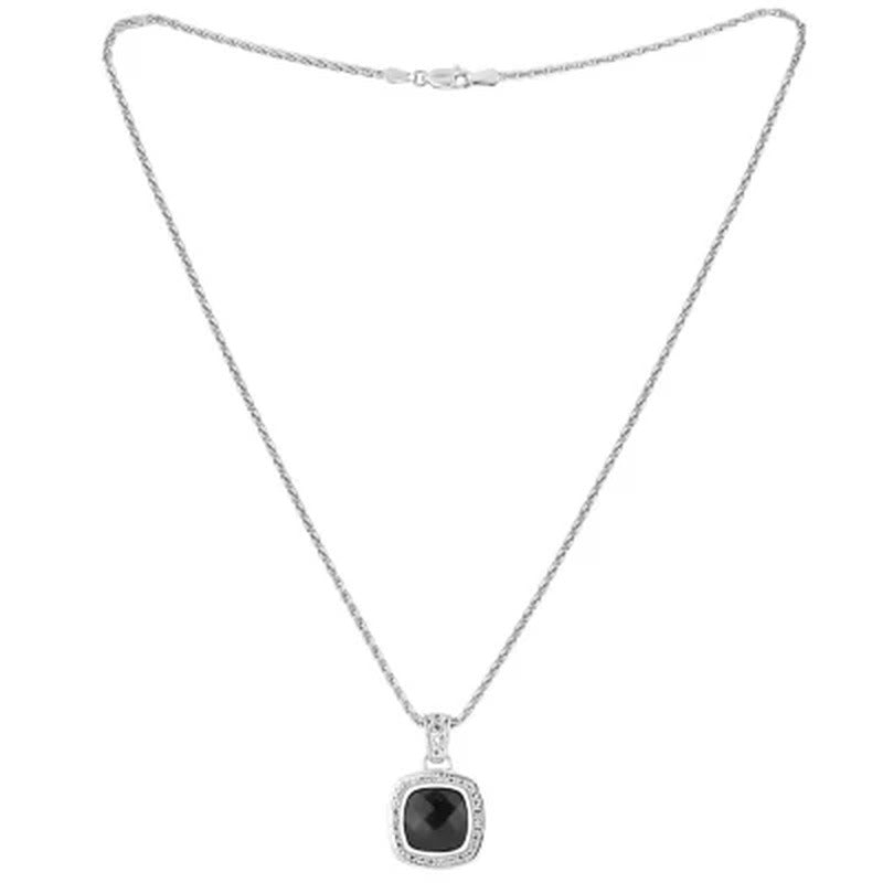 Sterling Silver Treated Onyx and 0.12 CT. T.W. Diamond Pendant