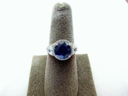 sapphire round shape certified set two half moon diamond