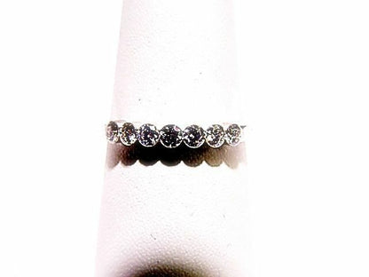 7 STONE ROUND BRILLIANT CUT INVISIBLE SET NO PRONGS