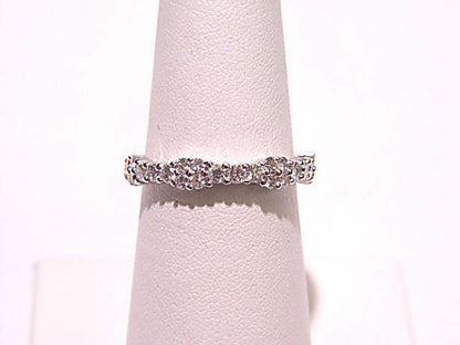 DIAMONDS PRONG SET ALL THE WAY AROUND ETERNITY