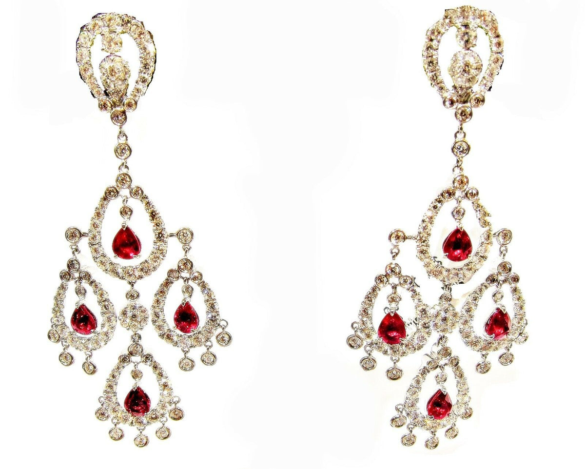 RUBY PEAR SHAPE EIGHT STONE SET WITH WHITE ROUND BRILLIANT