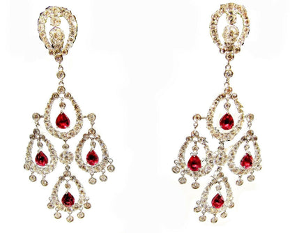 RUBY PEAR SHAPE EIGHT STONE SET WITH WHITE ROUND BRILLIANT