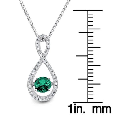 Dancing Lab Created Emerald and 0.12 CT. T.W. Diamond Infinity Pendant in Sterli