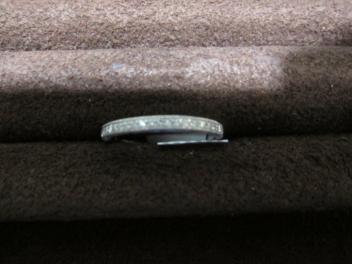 diamond round brilliant pave top set half way set band
