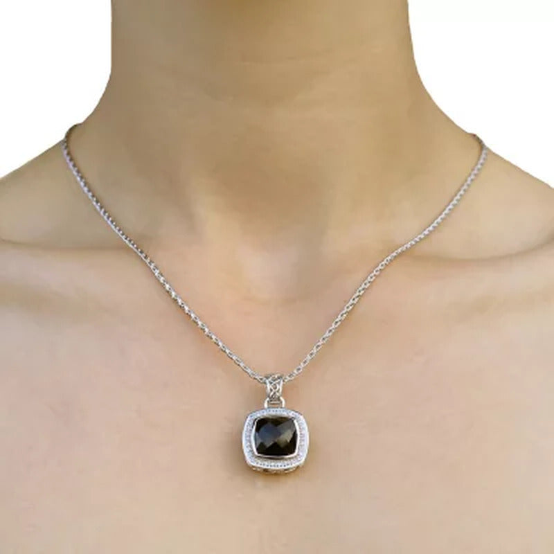 Sterling Silver Treated Onyx and 0.12 CT. T.W. Diamond Pendant