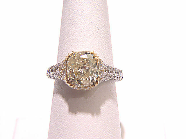 LABORATORY CERTIFIED CUSHION FANCY LIGHT YELLOW 2.60 CT CENTER SIDE 2.40 CT SI3