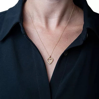 0.10 CT. T.W. Diamond Heart Pendant in 14K Yellow Gold