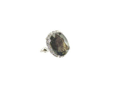 CERTIFIED GREEN SAPPHIRE OVAL FACETED 13.95X10.68X5.37MM SET ROUND DIAMOND HALO