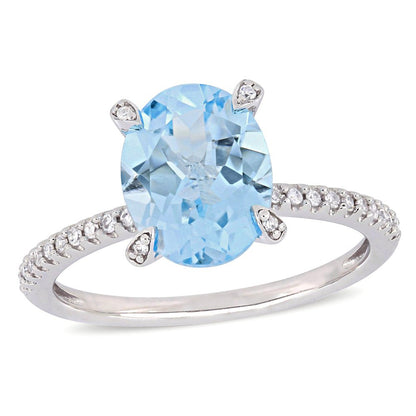 Miabella Women'S 3-4/5 Carat Oval-Cut T.G.W. Sky-Blue Topaz 1/4 Carat T.W. Diamo