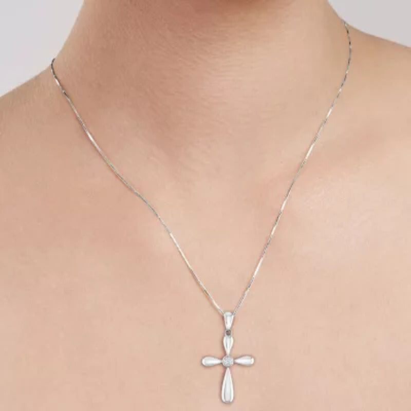 0.03 CT. T.W. Diamond Cross Pendant in 14K Gold