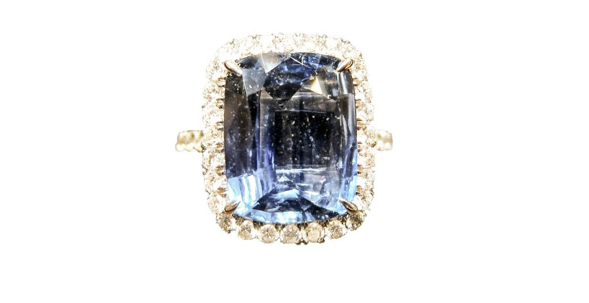 SAPPHIRE CYLON EMERALD SHAPE 12.90X10.06X4.80MM SET
