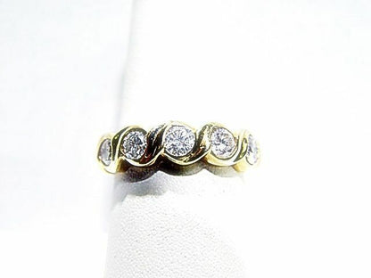 DIAMOND 5 ROUND BRILLIANT SHAPE BEZEL SET DIAMOND BAND