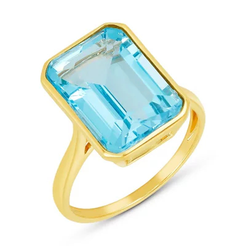 Sky Blue Topaz Emerald Shaped Ring in 14 Karat Yellow Gold