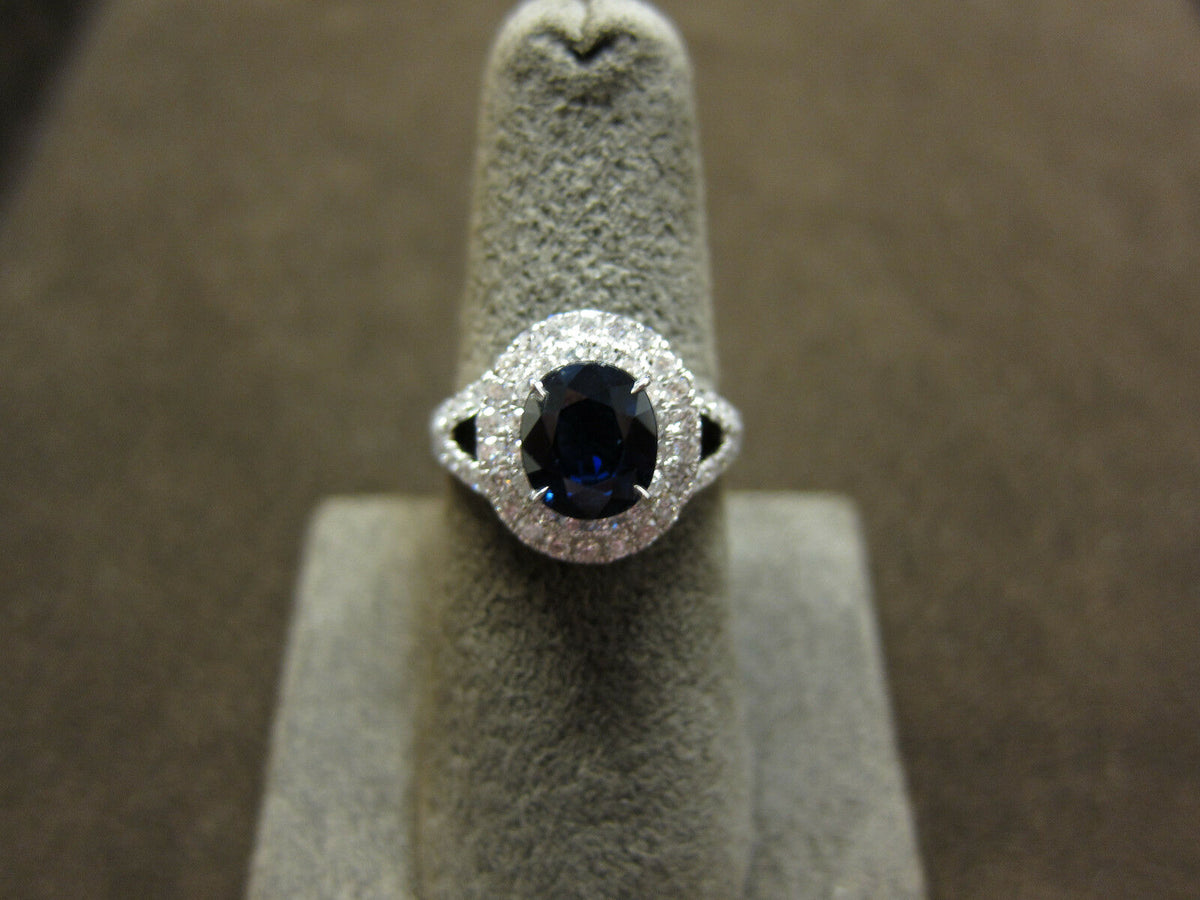 OVAL DEEP BLUE SAPPHIRE ROUND BRILLIANT PRONG SET DIAMOND