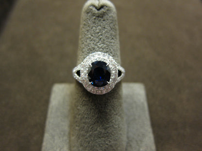 OVAL DEEP BLUE SAPPHIRE ROUND BRILLIANT PRONG SET DIAMOND