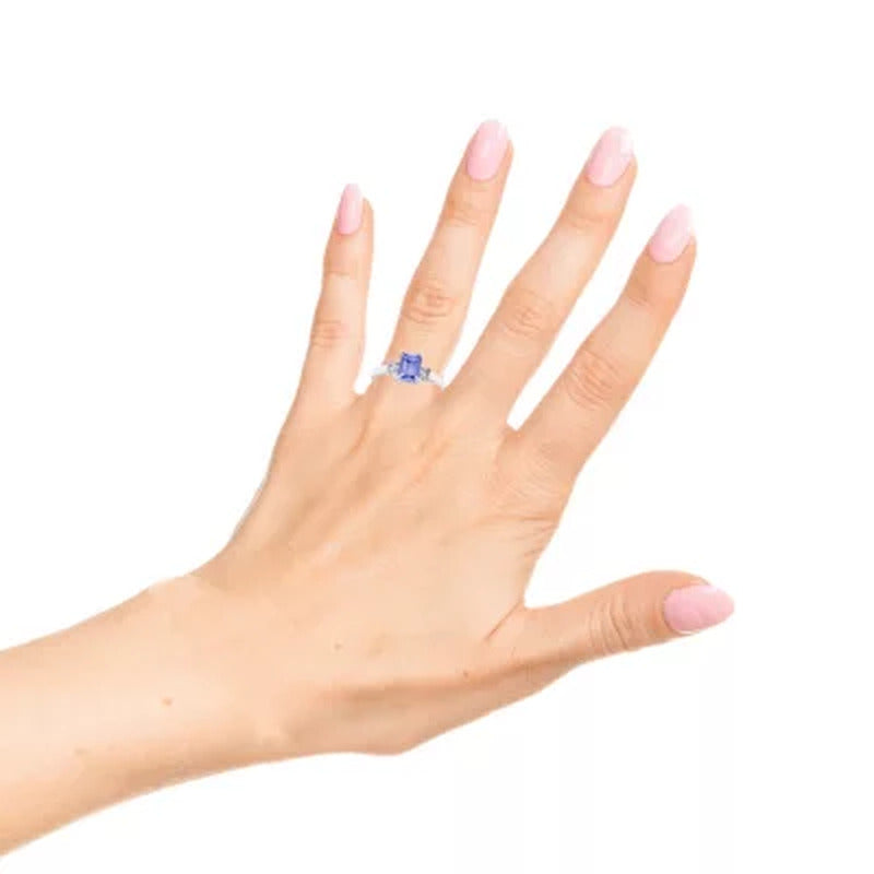 Three Stone Octogonal Tanzanite Ring with .20CT. T.W. Diamond Set in 14K Gold