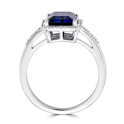 Lab Created Blue Sapphire and 0.14 CT. T.W. Diamond Ring in Sterling Silver