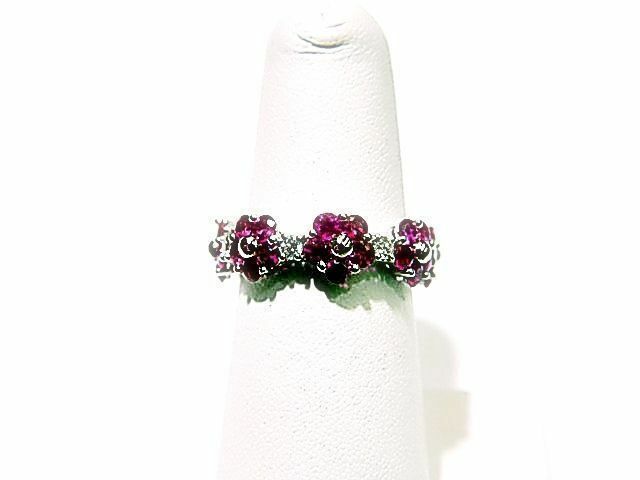 GEMSTONE ARE SET ALL THE WAY AROUND THE BAND ETERNITY BAND