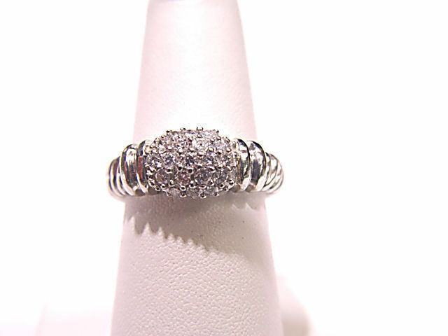 DIAMONDS PAVE SET ON TOP WITH GROOVE WORK MOUNTING