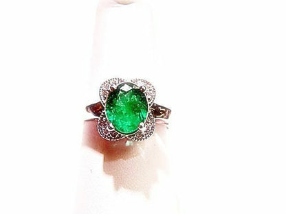 1.41 CT 1 OVAL EMERALD SET WITH ROUND BRILLIANT SHAPE DIAMOND .15 CT FLOWER RING
