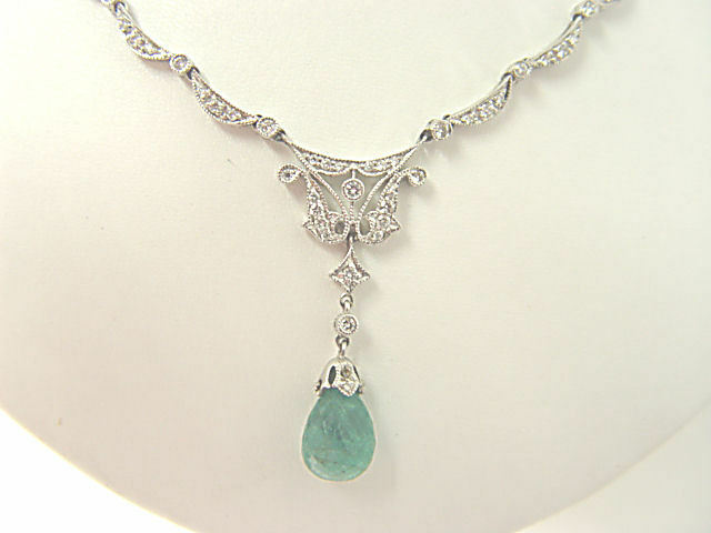 EMERALD BRIOLETTE SHAPE DIAMOND ROUND BRILLIANT SHAPE