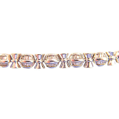 BAGUETTE SHAPE DIAMOND CHANNEL SET WITH GOLD BARS IN-BETWEEN DIAMOND